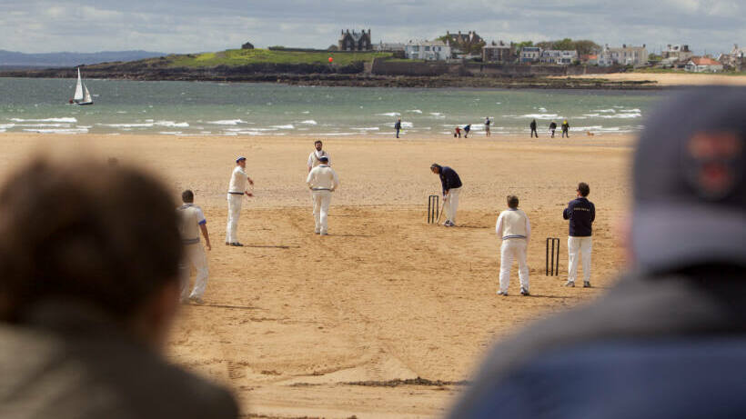Cricket being played on Elie Beach, in front of The Ship Inn