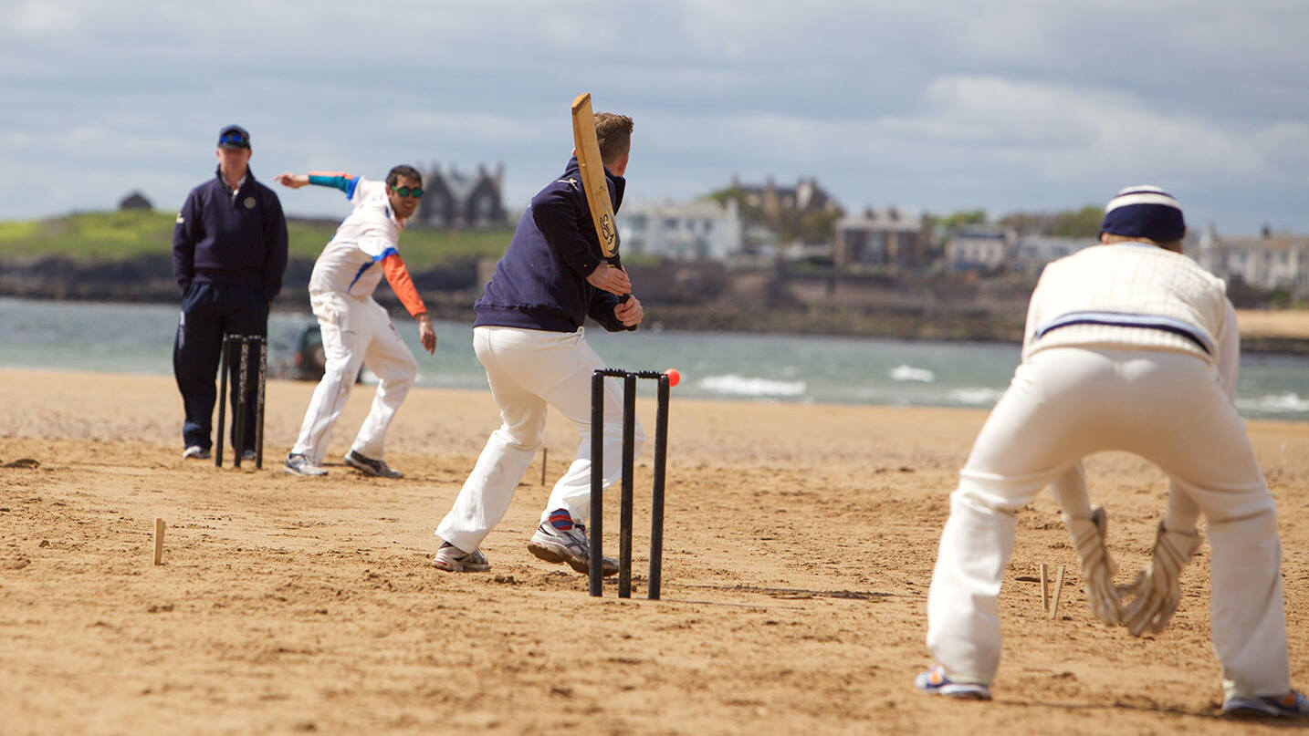 Cricket being played on the beach at The Ship Inn, Elie, Fife